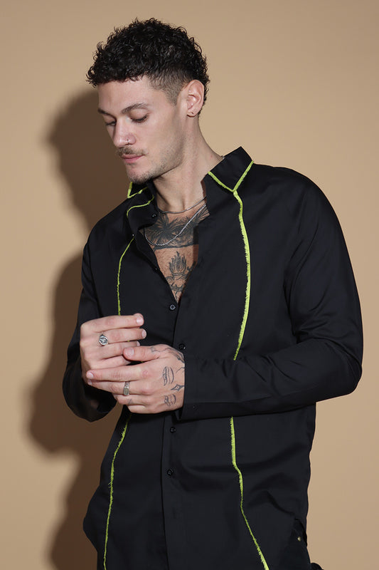 Get out of the Fringes and into the spotlight this season with this shirt exuding the confidence and charm. The raglan sleeved panelled shirt has a shirt collar and front button closure with button up sleeves without a cuff keeping it relaxed. The shirt is accented with a statement fringe around the collar and seams giving you a taller and leaner look. Giving you a little something extra, the shirt takes you from desk to dinner without much effort.