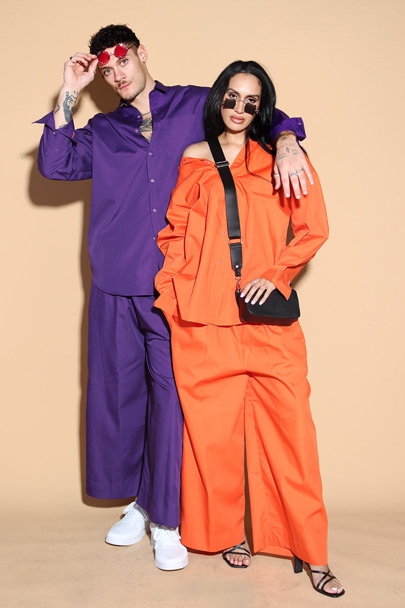 With a shirt collar and front button closure, the shirt in a luxe cotton blend is going to be your new favourite. It is accented with contrasting details showcasing your penchant for details, allowing you to make a statement in style with substance that demands a second look. The pants have an elasticated waist and a drawstring to adjust it however you like. Along with an easy and relaxed fit shirt, the separates can be styled together for a statement look or separately