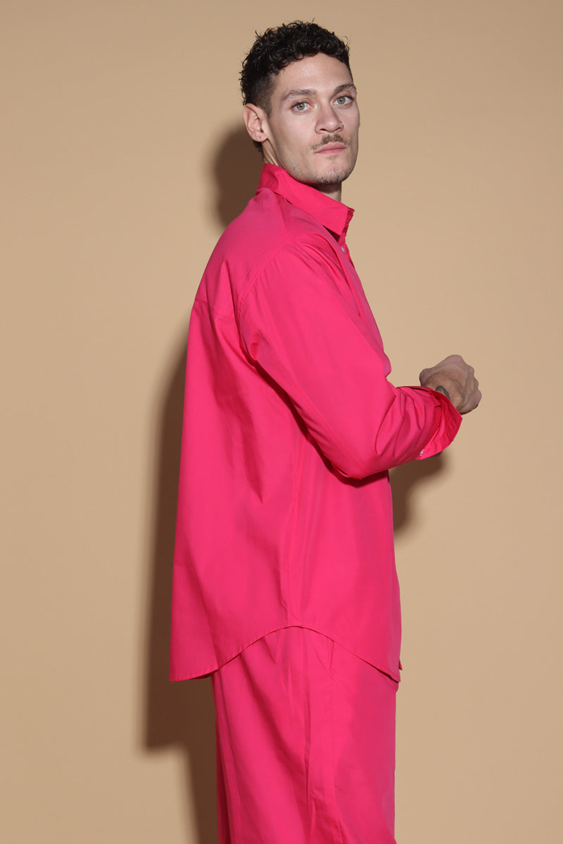 With a shirt collar and front button closure, the shirt in a luxe cotton blend is going to be your new favourite. It is accented with contrasting details showcasing your penchant for details, allowing you to make a statement in style with substance that demands a second look. The pants have an elasticated waist and a drawstring to adjust it however you like. . Embrace your inner barbie with this pink set