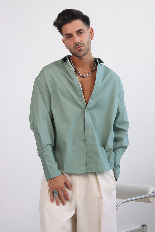 green shirt with printed trims and extra long cuff in a cropped shirt with button down and collar