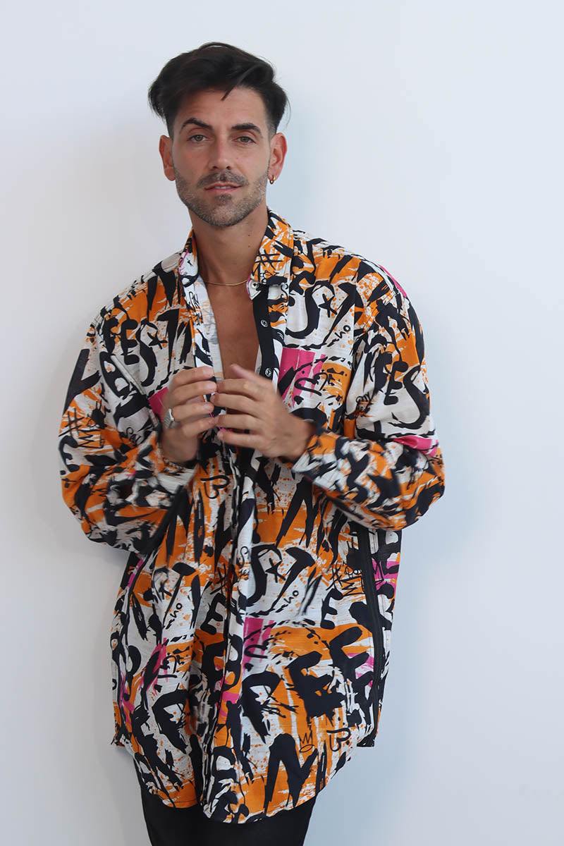 Graffiti print shirt with front button down and full sleeves with black ribbon trims and back tie with eyelets