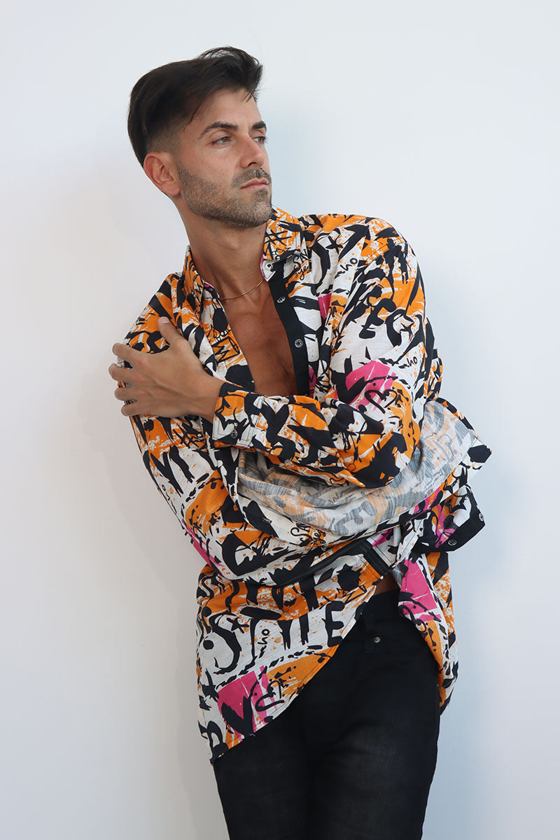 Graffiti print shirt with front button down and full sleeves with black ribbon trims and back tie with eyelets