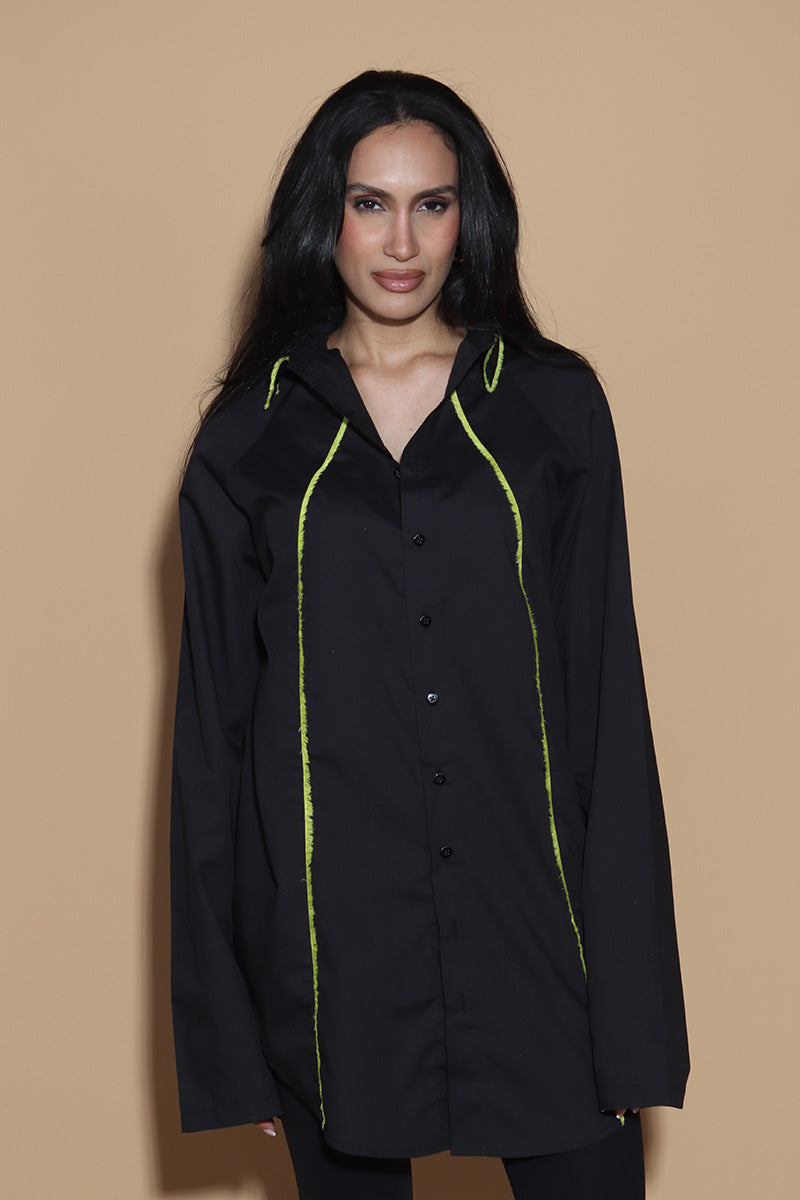 Get out of the Fringes and into the spotlight this season with this shirt exuding the confidence and charm. The raglan sleeved panelled shirt has a shirt collar and front button closure with button up sleeves without a cuff keeping it relaxed.  The shirt is accented with a statement fringe around the collar and seams giving you a taller and leaner look. Giving you a little something extra, the shirt takes you from desk to dinner without much effort.