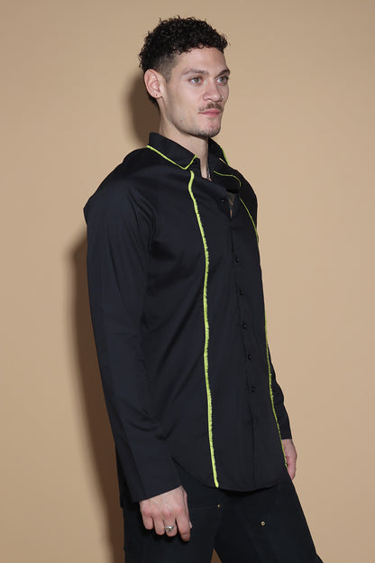 Get out of the Fringes and into the spotlight this season with this shirt exuding the confidence and charm. The raglan sleeved panelled shirt has a shirt collar and front button closure with button up sleeves without a cuff keeping it relaxed.  The shirt is accented with a statement fringe around the collar and seams giving you a taller and leaner look. Giving you a little something extra, the shirt takes you from desk to dinner without much effort.