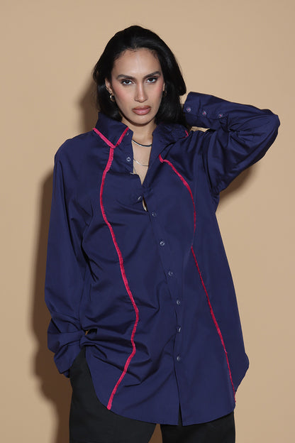 Get out of the Fringes and into the spotlight this season with this shirt exuding the confidence and charm. The raglan sleeved panelled shirt has a shirt collar and front button closure with button up sleeves without a cuff keeping it relaxed.  The shirt is accented with a statement fringe around the collar and seams giving you a taller and leaner look. Giving you a little something extra, the shirt takes you from desk to dinner without much effort.