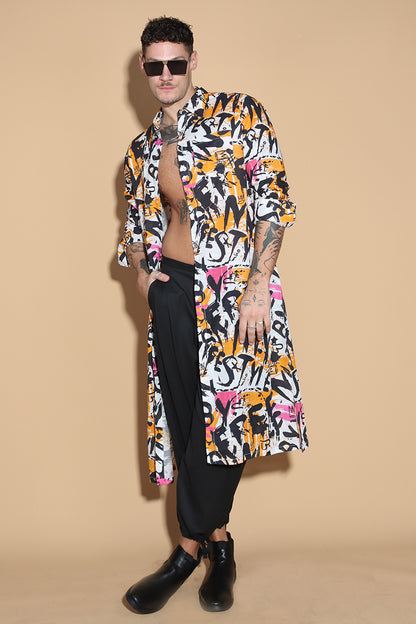 Go for a long tunic shirt that features our signature overall graffiti print that turns the heads for all the right reasons. The bold overall graffiti print showcases your individual personality marching to the beat of your own drum. In a textured Khaddar Cotton, the kurta tunic has a shirt collar and front button closure with side slits.