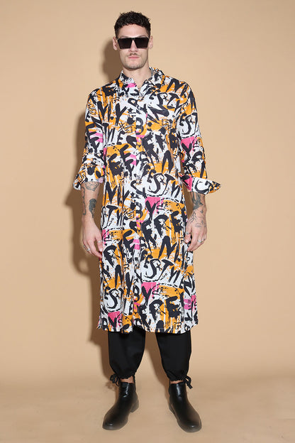 Go for a long tunic shirt that features our signature overall graffiti print that turns the heads for all the right reasons. The bold overall graffiti print showcases your individual personality marching to the beat of your own drum. In a textured Khaddar Cotton, the kurta tunic has a shirt collar and front button closure with side slits.