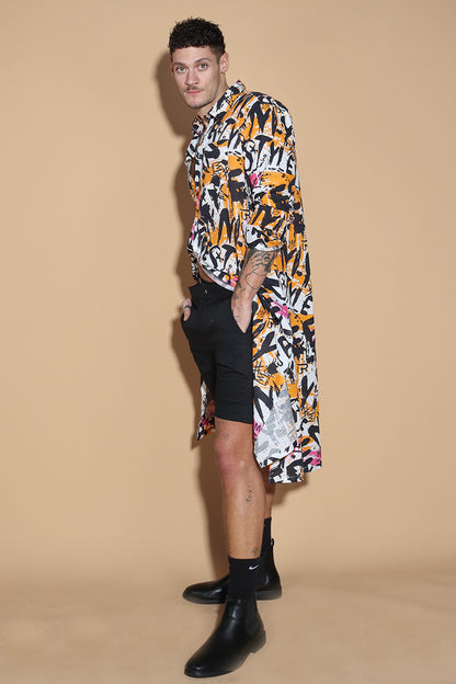 Go for a long tunic shirt that features our signature overall graffiti print that turns the heads for all the right reasons. The bold overall graffiti print showcases your individual personality marching to the beat of your own drum. In a textured Khaddar Cotton, the kurta tunic has a shirt collar and front button closure with side slits.