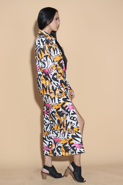 Go for a long tunic shirt that features our signature overall graffiti print that turns the heads for all the right reasons. The bold overall graffiti print showcases your individual personality marching to the beat of your own drum. In a textured Khaddar Cotton, the kurta tunic has a shirt collar and front button closure with side slits.