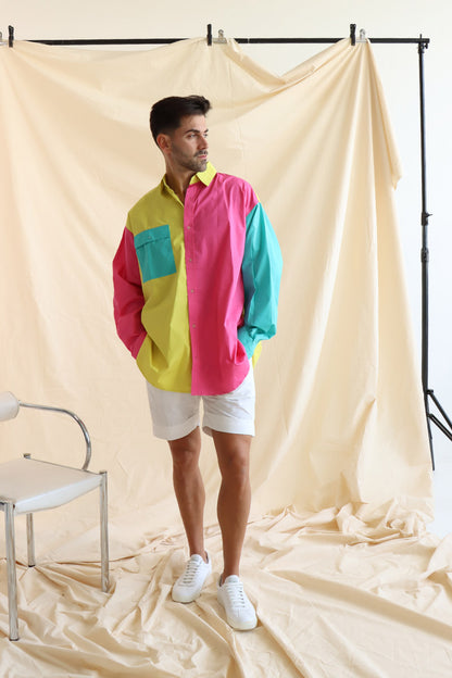 Person wearing multi coloured relaxed fit button up shirt with three colours and full sleeves in cotton