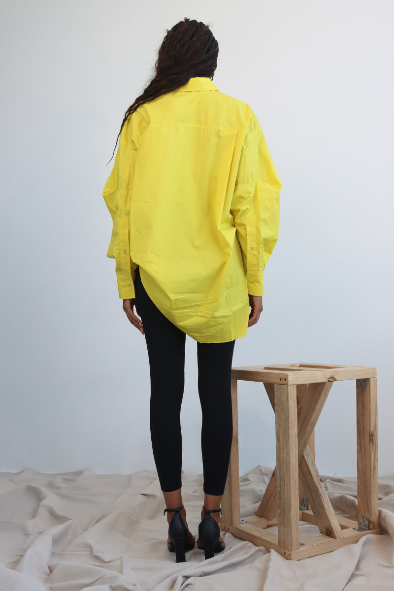 Yellow button down cotton shirt with puff sleeves and cerulean blue trim