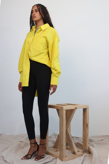 Yellow button down cotton shirt with puff sleeves and cerulean blue trim