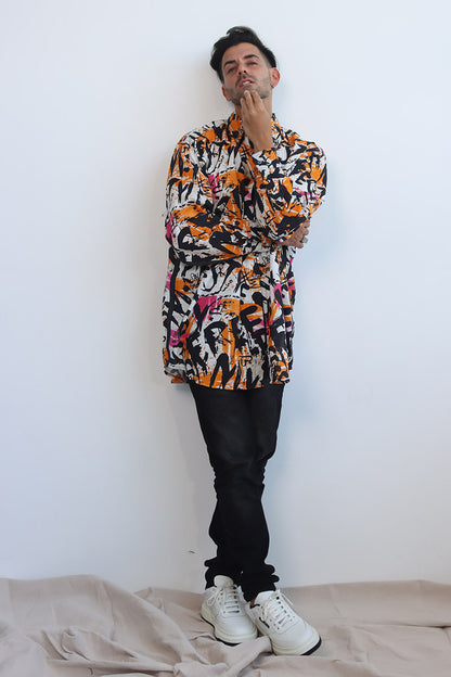 Graffiti print shirt with front button down and full sleeves with black ribbon trims and back tie with eyelets