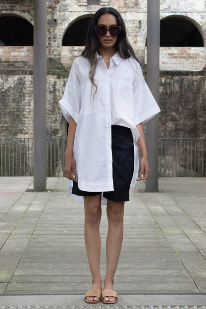 An easy fun short for the summer that is as versatile as it comes. Fitting to the a varying range of size, the short is your perfect summer staple. A tailored front gives it a polished look while the elasticated back sits it perfectly at your waist. The mid thigh length with an overturned cuff gives it an easy summer vibe. Wear it on the go or after a swim to go from beach, to bar to brunch. Style it with our Light shirt or Midnight Shirt and easy slides.