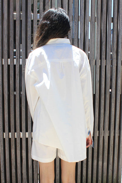 White Shirt and short twin set with contrasting stripe cuff and pocket and trim detail of the side of short and placket